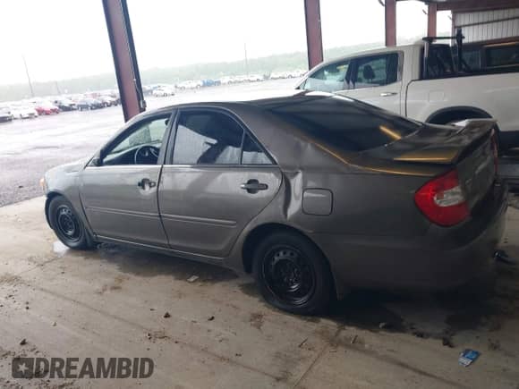 2004 Toyota Camry LE with VIN 4T1BE32KX4U919993, listed as a IAAI auction lot 42337318 with 182,660 mi miles and . Bid and sale history available at DreamBid. Image 14.