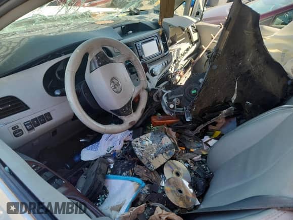 2013 Toyota Sienna XLE с VIN 5TDDK3DC4DS071187, выставлен на аукционе Copart как лот 82081295 с пробегом Не указан миль и Списание • Salvage title. История ставок и продаж доступна на DreamBid. Изображение 8.