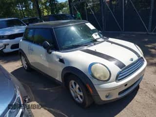 2009 MINI Hardtop with VIN WMWMF33549TU70209, listed as a IAAI auction lot 43147620 with 163,119 mi miles and . Bid and sale history available at DreamBid. Image 1.