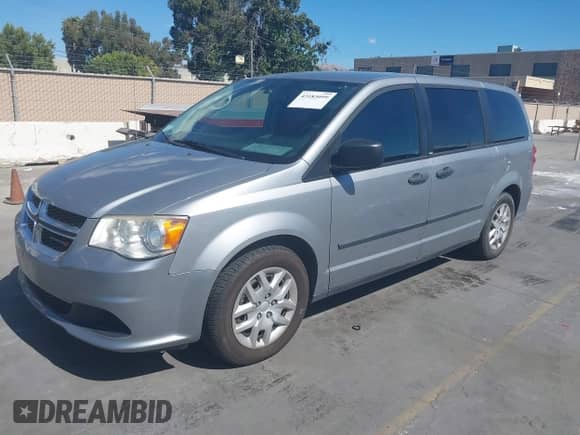2013 Dodge Grand Caravan SE with VIN 2C4RDGBG5DR819855, listed as a IAAI auction lot 43183099 with 154,612 mi miles and . Bid and sale history available at DreamBid. Image 2.