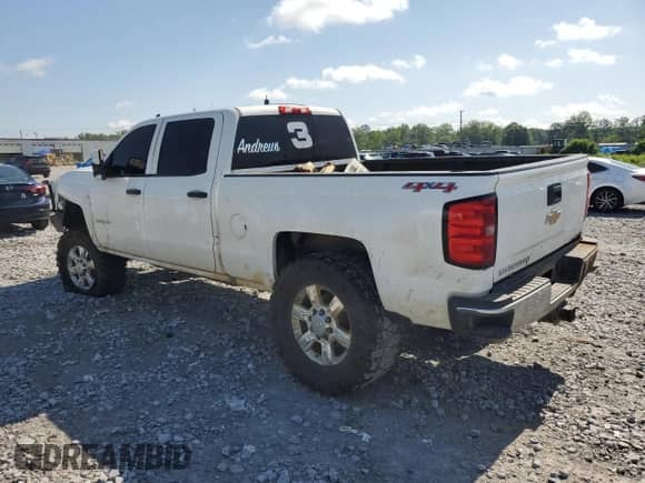 2015 Chevrolet Silverado 2500HD Work Truck z VIN 1GC1KUEG7FF663731, wystawiony jako Copart lot #57123715 z przebiegiem 167 082 mil mil oraz Szkoda całkowita • Salvage title. Historia ofert i sprzedaży dostępna na DreamBid. Obrazek 2.