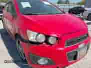 2015 Chevrolet Sonic LTZ with VIN 1G1JE6SBXF4103136, listed as a IAAI auction lot 43264836 with 138,290 mi miles and . Bid and sale history available at DreamBid. Image 6.
