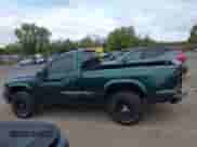 1999 Dodge Dakota с VIN 1B7GG26Y0XS261615, выставлен на аукционе IAAI как лот 43436216 с пробегом 126 384 миль миль и . История ставок и продаж доступна на DreamBid. Изображение 14.