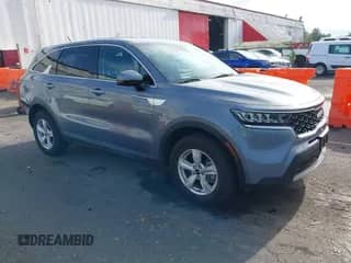 2023 Kia Sorento LX with VIN 5XYRGDLC7PG168609, listed as a IAAI auction lot 42893738 with 32,559 mi miles and . Bid and sale history available at DreamBid. Image 1.