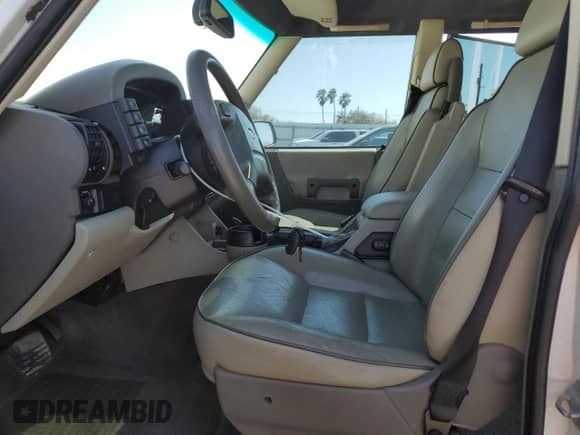 2004 Land Rover Discovery with VIN SALTP19494A839464, listed as a Copart auction lot 47502725 with 128,996 mi miles and Salvage title. Bid and sale history available at DreamBid. Image 7.