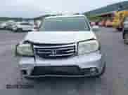 2014 Honda Pilot Touring with VIN 5FNYF4H97EB051760, listed as a IAAI auction lot 43329833 with 220,273 mi miles and . Bid and sale history available at DreamBid. Image 13.