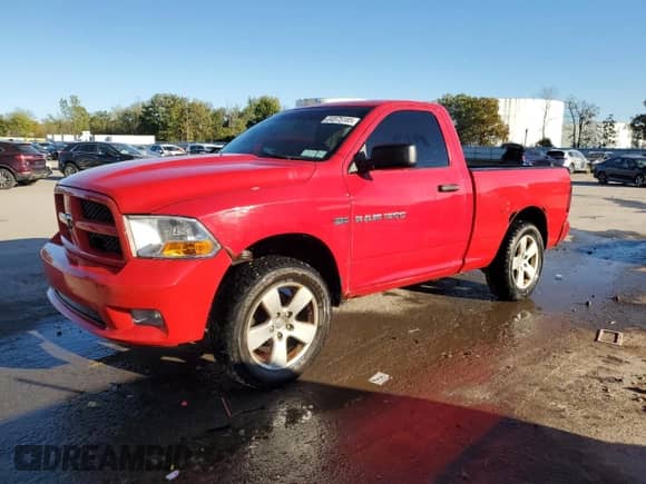 2012 Ram 1500 Express with VIN 3C6JD7AT0CG263039, listed as a Copart auction lot 84575185 with 202,886 mi miles and Salvage title. Bid and sale history available at DreamBid. Image 1.