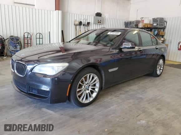 2015 BMW 7 Series 750i with VIN WBAYA8C50FD825699, listed as a Copart auction lot 87101895 with 130,651 mi miles and Clean title. Bid and sale history available at DreamBid. Image 1.
