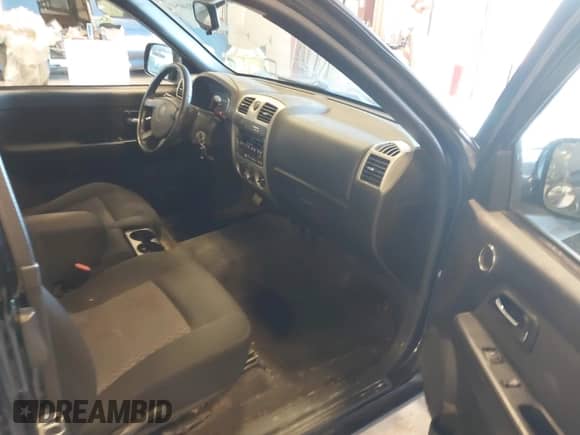 2009 Chevrolet Colorado Work Truck with VIN 1GCCS19E398127383, listed as a IAAI auction lot 43310054 with 129,208 mi miles and . Bid and sale history available at DreamBid. Image 5.