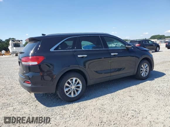 2018 Kia Sorento LX z VIN 5XYPG4A38JG396068, wystawiony jako Copart lot #70809795 z przebiegiem 88 765 mil mil oraz Szkoda całkowita • Salvage title. Historia ofert i sprzedaży dostępna na DreamBid. Obrazek 3.