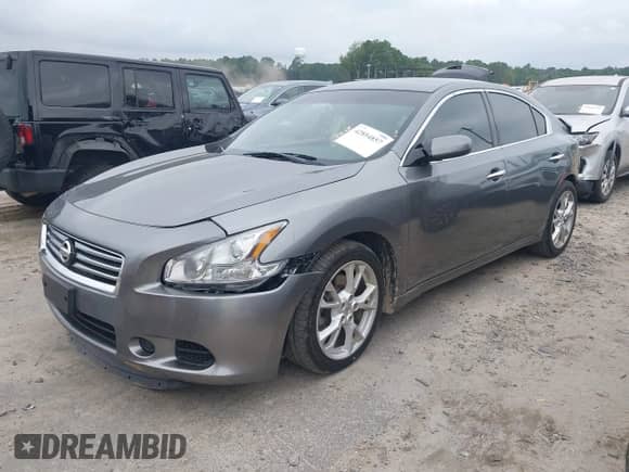 2014 Nissan Maxima SV z VIN 1N4AA5AP6EC488005, wystawiony jako IAAI lot #42894857 z przebiegiem 93 618 mil mil oraz . Historia ofert i sprzedaży dostępna na DreamBid. Obrazek 2.