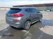 2021 Hyundai Tucson Sport with VIN KM8J33ALXMU344080, listed as a IAAI auction lot 43131097 with 112,525 mi miles and . Bid and sale history available at DreamBid. Image 4.