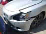 2014 Nissan Maxima SV z VIN 1N4AA5AP6EC470295, wystawiony jako IAAI lot #42551564 z przebiegiem 191 814 mil mil oraz . Historia ofert i sprzedaży dostępna na DreamBid. Obrazek 6.