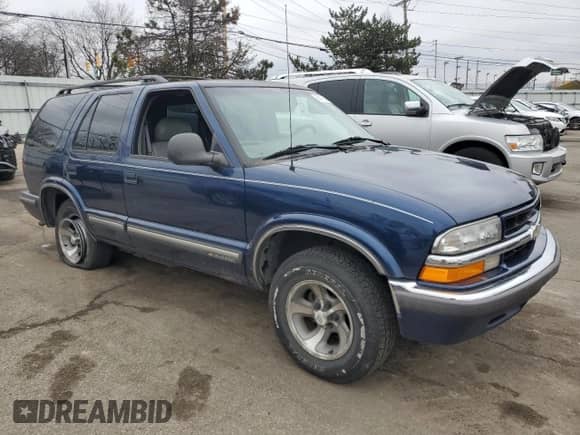 1998 Chevrolet Blazer LS with VIN 1GNCS13W2W2250714, listed as a Copart auction lot 86473604 with Not provided miles and Salvage title. Bid and sale history available at DreamBid. Image 4.