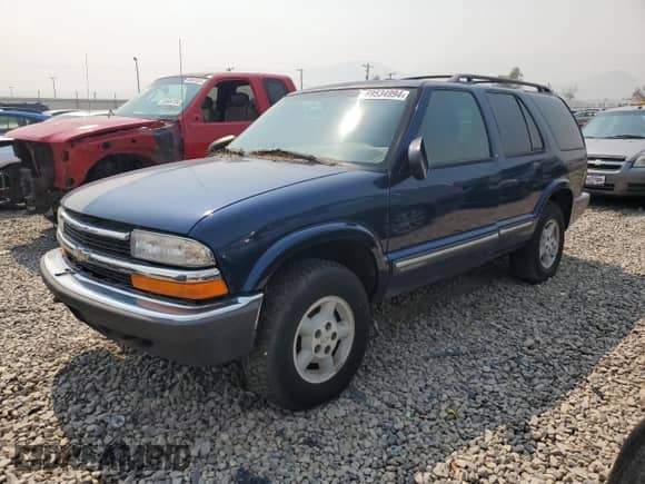 2001 Chevrolet Blazer LT z VIN 1GNDT13W61K226300, wystawiony jako Copart lot #69534994 z przebiegiem Nie podano mil oraz Czysty tytuł • Clean title. Historia ofert i sprzedaży dostępna na DreamBid. Obrazek 1.