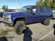 1999 Chevrolet Suburban with VIN 1GNEC16R9XJ307672, listed as a Copart auction lot 78663054 with 198,081 mi miles and Non repairable. Bid and sale history available at DreamBid. Image 1.