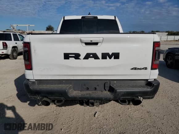 2022 Ram 1500 TRX с VIN 1C6SRFU91NN252416, выставлен на аукционе Copart как лот 85870095 с пробегом 64 500 миль миль и Списание • Salvage title. История ставок и продаж доступна на DreamBid. Изображение 6.