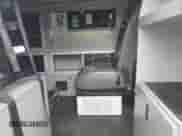 2012 Ford Econoline Cargo Commercial with VIN 1FDSS3EL1CDB10281, listed as a IAAI auction lot 41410176 with 590,744 mi miles and . Bid and sale history available at DreamBid. Image 8.