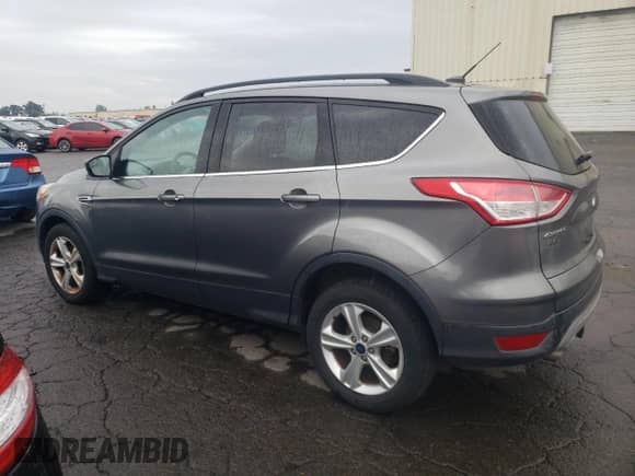 2014 Ford Escape SE with VIN 1FMCU0G96EUC60713, listed as a Copart auction lot 84621275 with 138,146 mi miles and Clean title. Bid and sale history available at DreamBid. Image 2.
