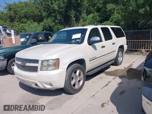 2011 Chevrolet Suburban LTZ с VIN 1GNSCKE09BR201504, выставлен на аукционе IAAI как лот 42703687 с пробегом 223 838 миль миль и . История ставок и продаж доступна на DreamBid. Изображение 2.