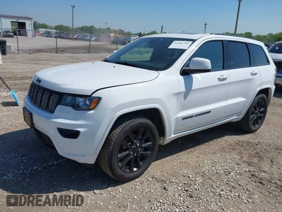 2020 Jeep Grand Cherokee Altitude with VIN 1C4RJFAGXLC271279, listed as a IAAI auction lot 42296705 with 72,172 mi miles and . Bid and sale history available at DreamBid. Image 17.