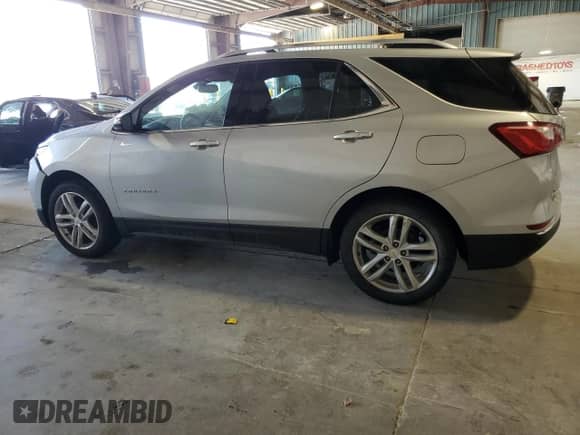 2018 Chevrolet Equinox Premier with VIN 2GNAXVEV4J6311755, listed as a Copart auction lot 67010725 with 104,590 mi miles and Salvage title. Bid and sale history available at DreamBid. Image 2.