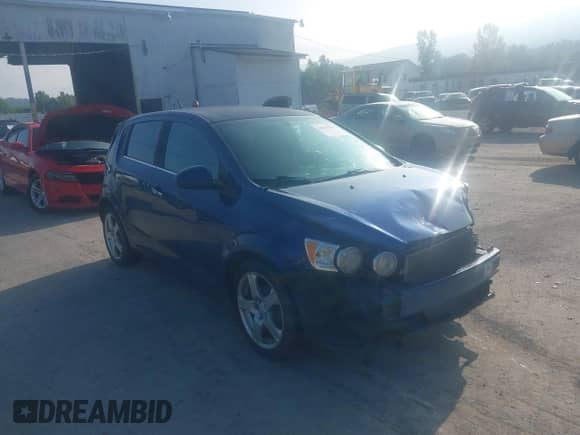 2014 Chevrolet Sonic LTZ with VIN 1G1JE6SB3E4200225, listed as a IAAI auction lot 42840609 with 104,410 mi miles and . Bid and sale history available at DreamBid. Image 1.