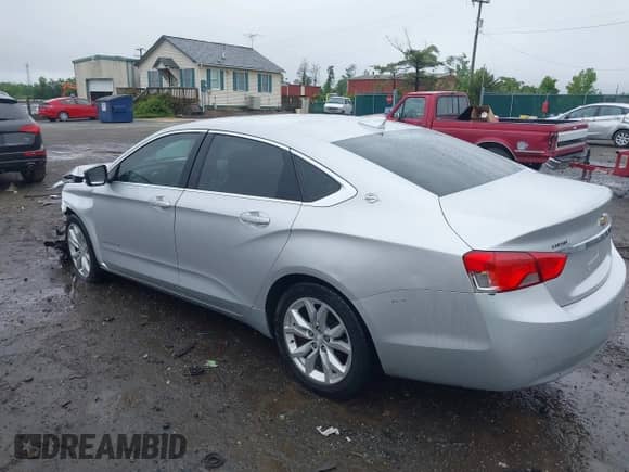 2018 Chevrolet Impala LT with VIN 1G1105SA1JU131478, listed as a IAAI auction lot 42341889 with 201,328 mi miles and . Bid and sale history available at DreamBid. Image 3.