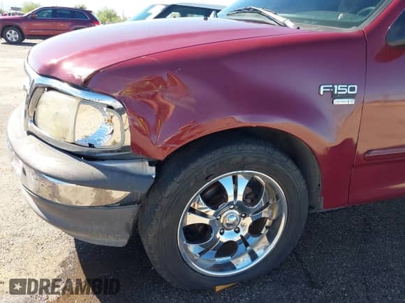 1999 Ford F-150 with VIN 1FTRX17W3XKB03527, listed as a IAAI auction lot 43450405 with 121,752 mi miles and . Bid and sale history available at DreamBid. Image 6.