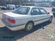 1992 Honda Accord LX z VIN JHMCB7659NC048944, wystawiony jako IAAI lot #41704471 z przebiegiem 253 535 mil mil oraz . Historia ofert i sprzedaży dostępna na DreamBid. Obrazek 4.