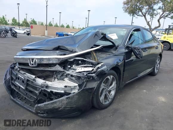 2019 Honda Accord EX-L with VIN 1HGCV2F51KA023475, listed as a IAAI auction lot 42407694 with 102,527 mi miles and . Bid and sale history available at DreamBid. Image 2.