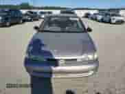 2000 Chevrolet Prizm with VIN 1Y1SK5485YZ407556, listed as a Copart auction lot 60894355 with 123,708 mi miles and Salvage title. Bid and sale history available at DreamBid. Image 5.
