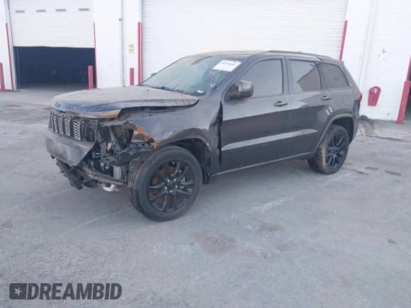 2021 Jeep Grand Cherokee Laredo E with VIN 1C4RJEAG3MC681031, listed as a IAAI auction lot 40734451 with 47,147 mi miles and . Bid and sale history available at DreamBid. Image 2.