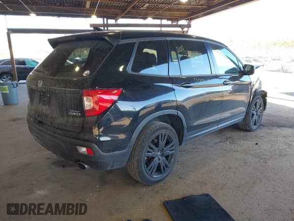 2021 Honda Passport Sport with VIN 5FNYF8H27MB021098, listed as a IAAI auction lot 41333241 with 101,239 mi miles and . Bid and sale history available at DreamBid. Image 4.