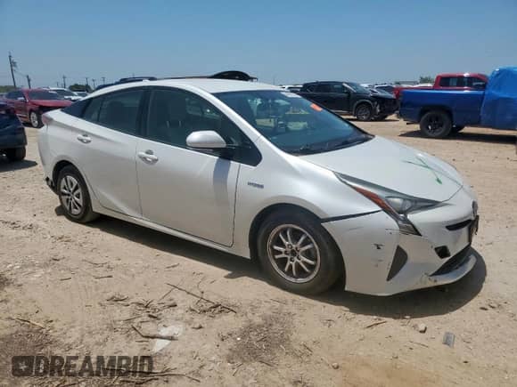 2016 Toyota Prius Three z VIN JTDKARFU8G3500405, wystawiony jako Copart lot #64698235 z przebiegiem Nie podano mil oraz Szkoda całkowita • Salvage title. Historia ofert i sprzedaży dostępna na DreamBid. Obrazek 4.