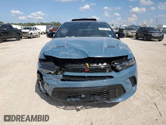 2024 Dodge Hornet R/T Plus с VIN ZACPDFDW6R3A22300, выставлен на аукционе Copart как лот 69647344 с пробегом Не указан миль и Списание • Salvage title. История ставок и продаж доступна на DreamBid. Изображение 5.