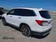 2022 Honda Pilot Touring 7-Passenger z VIN 5FNYF5H66NB034248, wystawiony jako IAAI lot #41777362 z przebiegiem 26 611 mil mil oraz . Historia ofert i sprzedaży dostępna na DreamBid. Obrazek 3.