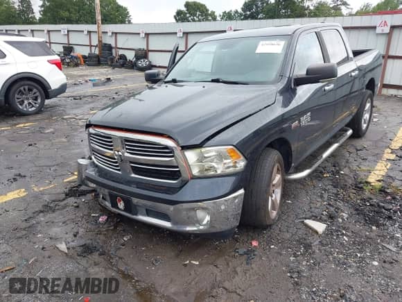 2015 Ram 1500 Outdoorsman with VIN 1C6RR6LT3FS624059, listed as a IAAI auction lot 42958636 with 201,079 mi miles and . Bid and sale history available at DreamBid. Image 2.