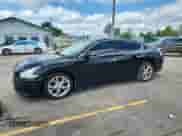 2014 Nissan Maxima S with VIN 1N4AA5AP1EC456787, listed as a Copart auction lot 69573785 with 177,420 mi miles and Salvage title. Bid and sale history available at DreamBid. Image 1.