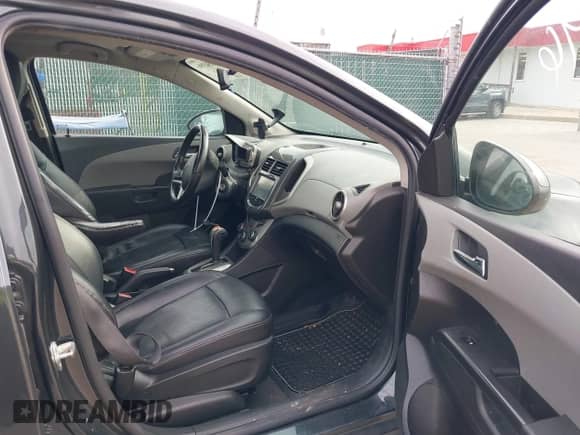 2014 Chevrolet Sonic LTZ with VIN 1G1JE5SB1E4200234, listed as a IAAI auction lot 41850396 with 173,324 mi miles and . Bid and sale history available at DreamBid. Image 5.