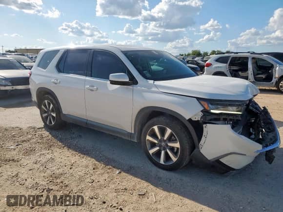 2024 Honda Pilot Touring с VIN 5FNYG2H77RB006064, выставлен на аукционе Copart как лот 62533225 с пробегом 20 651 миль миль и Списание • Salvage title. История ставок и продаж доступна на DreamBid. Изображение 4.