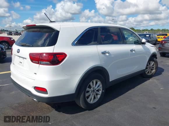 2019 Kia Sorento LX with VIN 5XYPG4A56KG475936, listed as a IAAI auction lot 42774927 with 165,286 mi miles and . Bid and sale history available at DreamBid. Image 4.