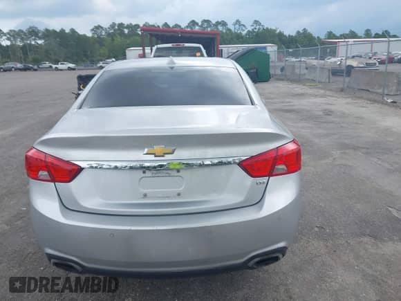 2014 Chevrolet Impala LTZ with VIN 1G1145SL0EU132343, listed as a IAAI auction lot 42799445 with 107,913 mi miles and . Bid and sale history available at DreamBid. Image 16.