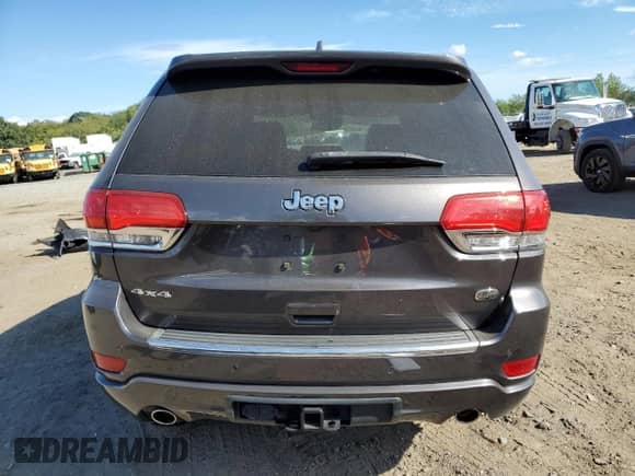 2017 Jeep Grand Cherokee Overland with VIN 1C4RJFCG3HC694208, listed as a Copart auction lot 71187645 with 67,455 mi miles and Salvage title. Bid and sale history available at DreamBid. Image 6.
