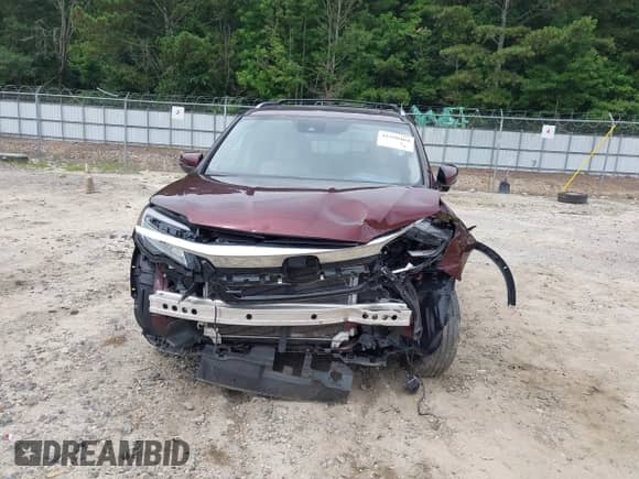 2021 Honda Pilot Touring 7-Passenger z VIN 5FNYF6H66MB062166, wystawiony jako IAAI lot #42550464 z przebiegiem 52 376 mil mil oraz . Historia ofert i sprzedaży dostępna na DreamBid. Obrazek 6.