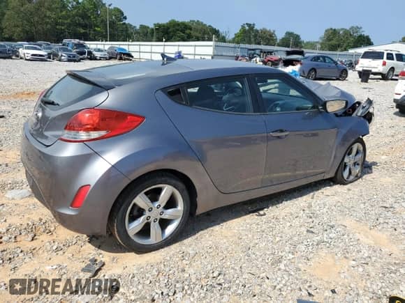2012 Hyundai Veloster w/Black Int z VIN KMHTC6AD7CU028864, wystawiony jako Copart lot #66377895 z przebiegiem 130 440 mil mil oraz Szkoda całkowita • Salvage title. Historia ofert i sprzedaży dostępna na DreamBid. Obrazek 3.