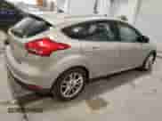 2015 Ford Focus SE z VIN 1FADP3K24FL201491, wystawiony jako Copart lot #82738265 z przebiegiem 182 371 mil mil oraz Szkoda całkowita • Salvage title. Historia ofert i sprzedaży dostępna na DreamBid. Obrazek 3.