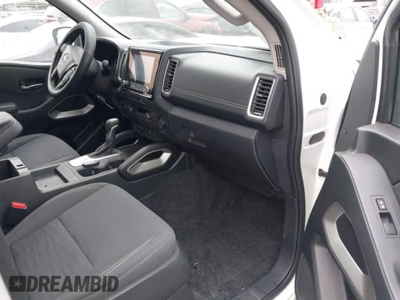 2023 Nissan Frontier SV with VIN 1N6ED1FKXPN650697, listed as a IAAI auction lot 42289020 with 19,715 mi miles and . Bid and sale history available at DreamBid. Image 5.