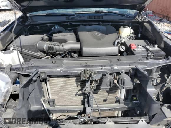 2022 Toyota Tacoma TRD Off Road with VIN 3TMCZ5AN4NM515100, listed as a Copart auction lot 84576995 with 33,917 mi miles and Salvage title. Bid and sale history available at DreamBid. Image 11.