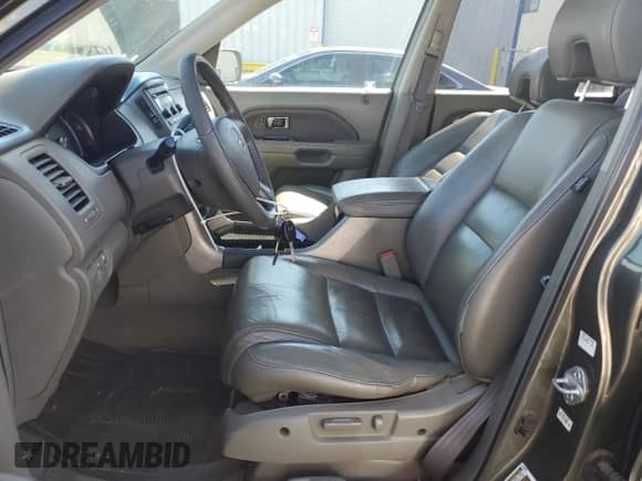 2006 Honda Pilot EX-L z VIN 2HKYF18546H521158, wystawiony jako Copart lot #82399125 z przebiegiem 180 921 mil mil oraz Szkoda całkowita • Salvage title. Historia ofert i sprzedaży dostępna na DreamBid. Obrazek 7.